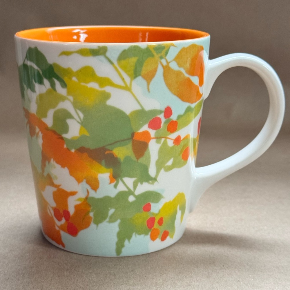 2008 Starbucks Orange Floral Ceramic Coffee Mug. 14 fl oz